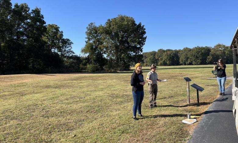 Paige Ford and Robin Gabe during a Parkeology event at Plum Bayou Mounds Archeological State Park. 